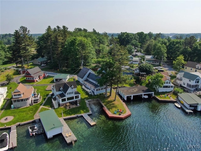 21157 Home St, Alexandria, NY 13607 - aerial view of residential area with a large body of water and a forest