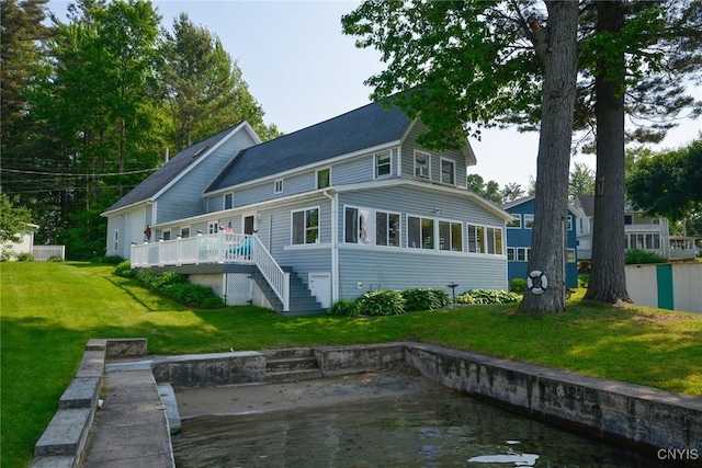 21157 Home St, Alexandria, NY 13607 - rear view of property with a wooden deck, a yard, and stairway