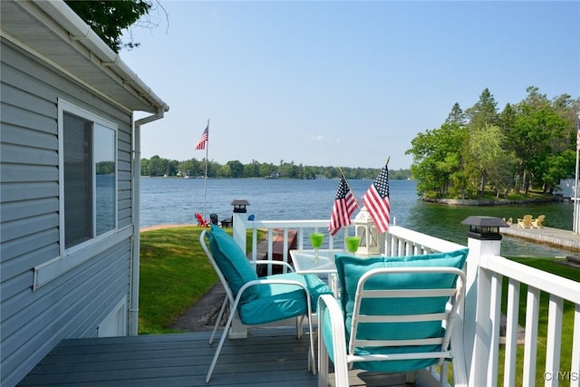 21157 Home St, Alexandria, NY 13607 - wooden deck with a water view