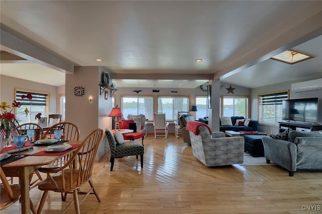 21157 Home St, Alexandria, NY 13607 - living area with light wood-style floors, a wall unit AC, and recessed lighting