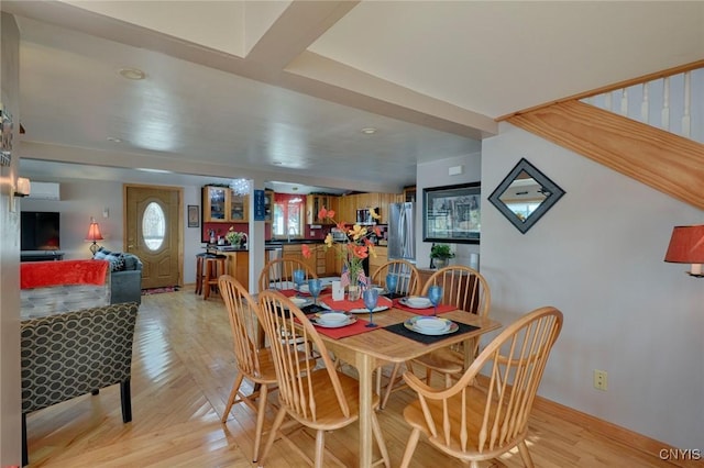 21157 Home St, Alexandria, NY 13607 - dining area with light wood-type flooring and bar