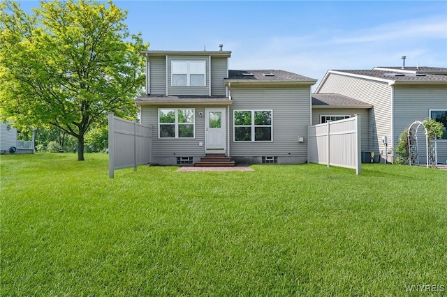 6 Hedge Ln, Lancaster, NY 14086 - back of house with entry steps and roof with shingles