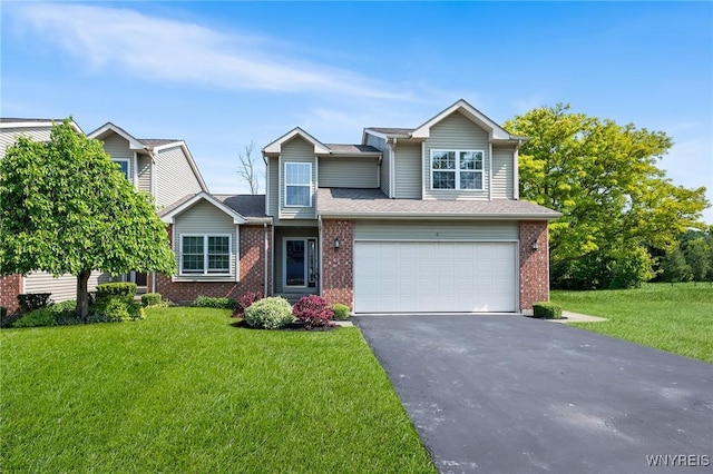 6 Hedge Ln, Lancaster, NY 14086 - traditional home featuring a garage, asphalt driveway, brick siding, and a front yard