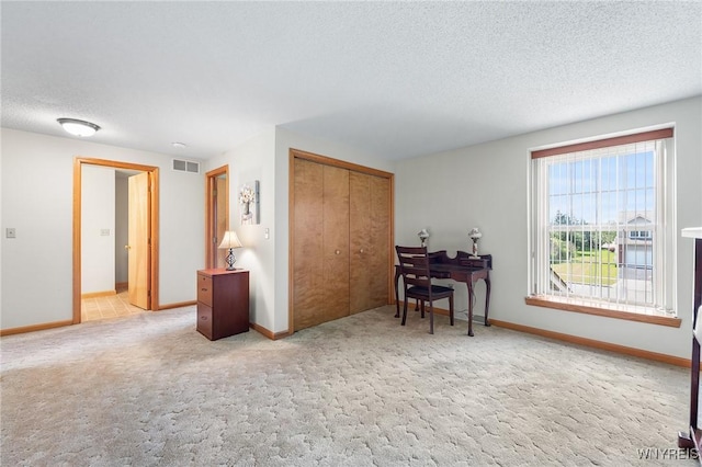 6 Hedge Ln, Lancaster, NY 14086 - carpeted home office featuring a textured ceiling and baseboards