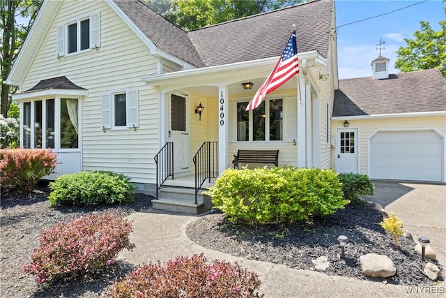 10400 Springville Boston Rd, Concord, NY 14141 - view of front of house with a shingled roof, an attached garage, and driveway