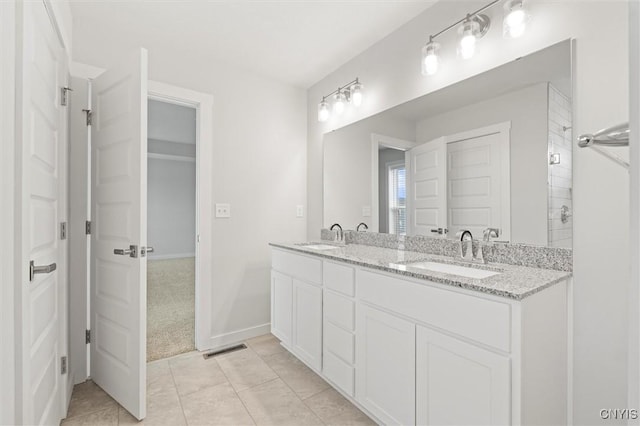 4835 Lepinske Farm Pl, Clay, NY 13041 - bathroom with double vanity and tile patterned flooring