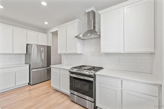 4835 Lepinske Farm Pl, Clay, NY 13041 - kitchen with appliances with stainless steel finishes, wall chimney range hood, decorative backsplash, light countertops, and recessed lighting