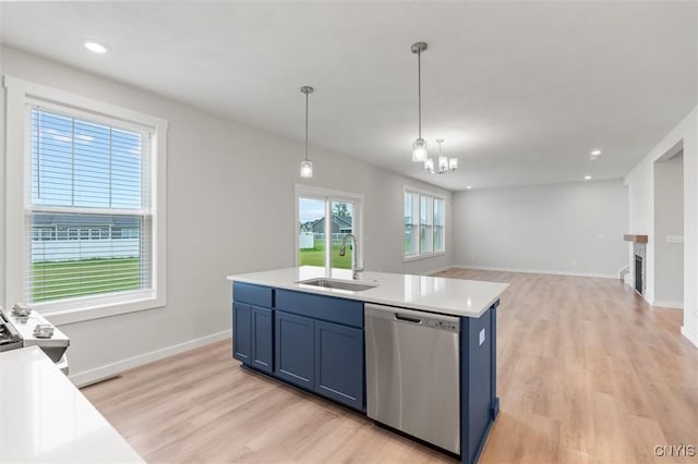 4835 Lepinske Farm Pl, Clay, NY 13041 - kitchen featuring stainless steel dishwasher, light wood-style floors, blue cabinetry, and recessed lighting