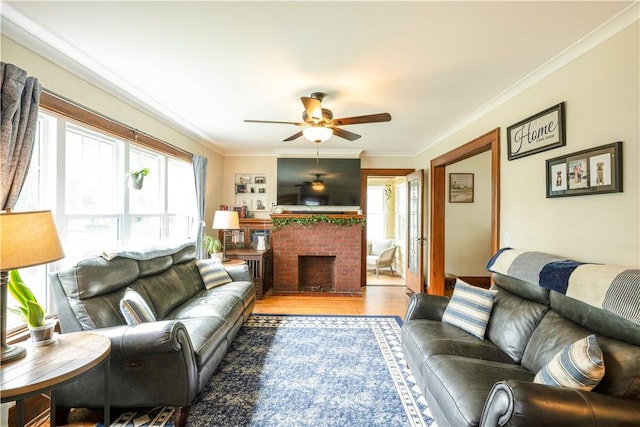 51 Whitby Rd, Irondequoit, NY 14609 - living area with ceiling fan, wood finished floors, ornamental molding, and a fireplace