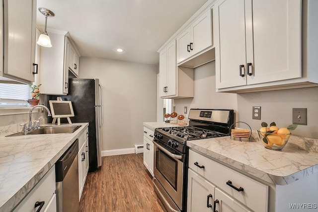 235 Koenig Rd, Tonawanda-Town, NY 14150 - kitchen with appliances with stainless steel finishes, dark wood-style floors, white cabinetry, light countertops, and recessed lighting