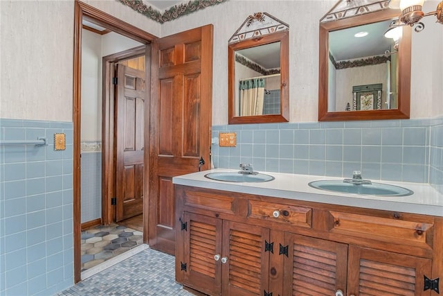 285 Panorama, Penfield, NY 14625 - full bath with tile walls, double vanity, a wainscoted wall, and tile patterned flooring