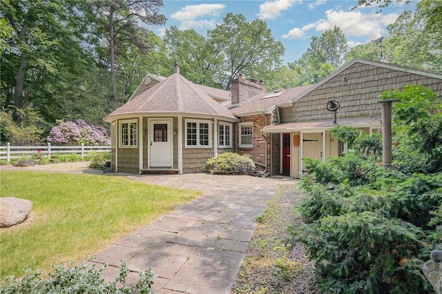 285 Panorama, Penfield, NY 14625 - view of front of property with a chimney and roof with shingles