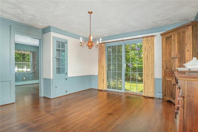 285 Panorama, Penfield, NY 14625 - unfurnished dining area featuring a baseboard radiator, a chandelier, wood finished floors, a baseboard heating unit, and a wainscoted wall