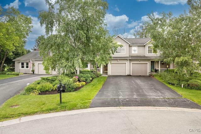 5810 Nobleton Cir, Onondaga, NY 13078 - view of front of property with driveway, a garage, and a front yard