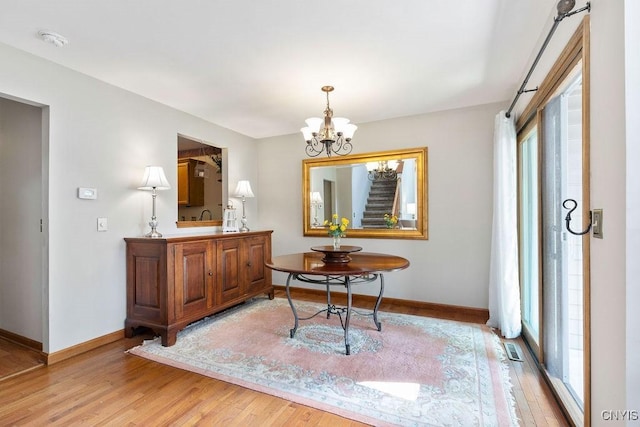 5810 Nobleton Cir, Onondaga, NY 13078 - full bathroom with wood finished floors and a chandelier