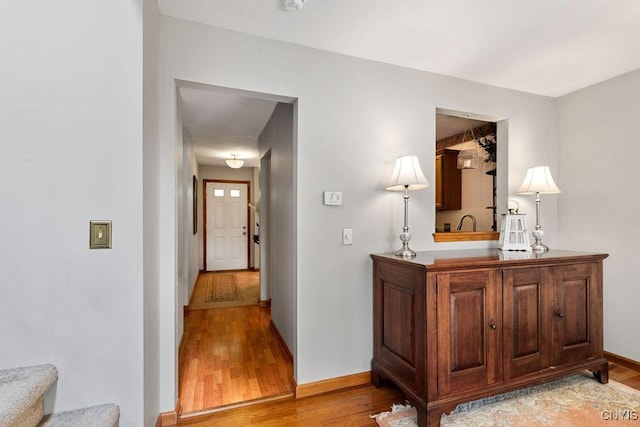5810 Nobleton Cir, Onondaga, NY 13078 - hallway featuring light wood-style floors