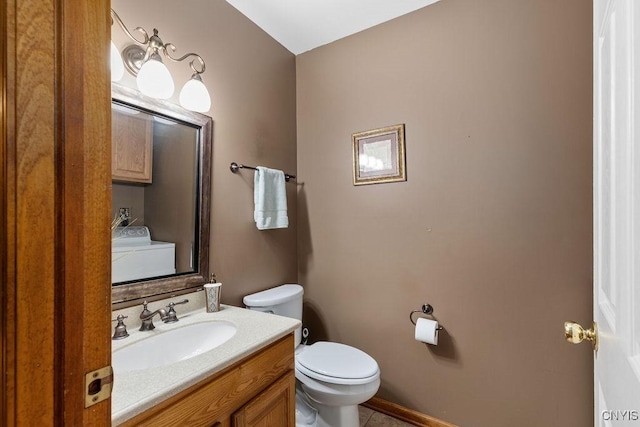 5810 Nobleton Cir, Onondaga, NY 13078 - bathroom featuring vanity and washer / clothes dryer