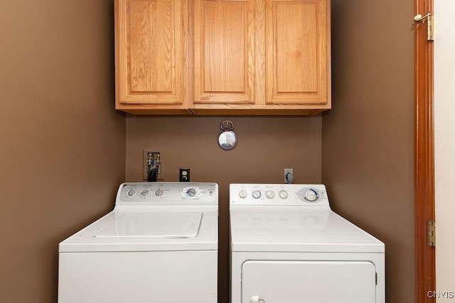 5810 Nobleton Cir, Onondaga, NY 13078 - washroom featuring cabinet space and washing machine and dryer