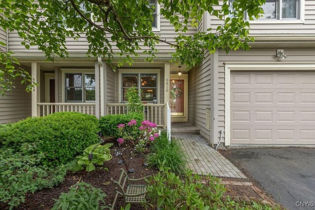 5810 Nobleton Cir, Onondaga, NY 13078 - doorway to property with covered porch