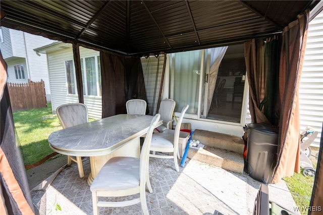 74 N Castlerock Ln, Amherst, NY 14051 - view of patio featuring a gazebo and outdoor dining space