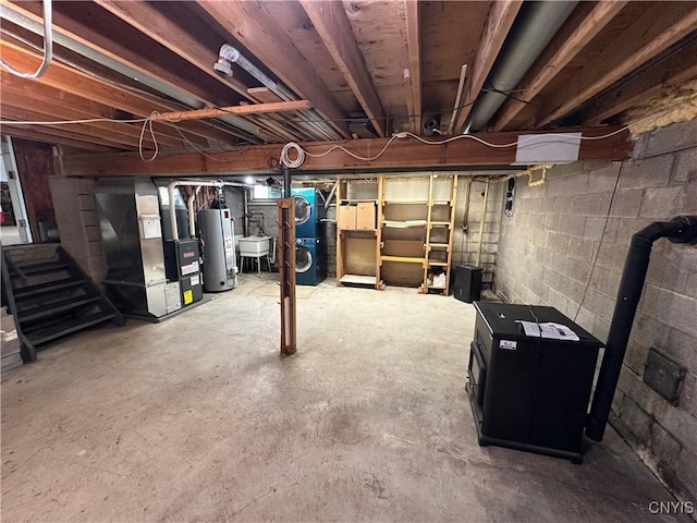 8071 Evesborough Dr, Clay, NY 13041 - unfinished below grade area featuring gas water heater and heating unit