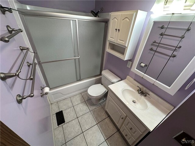 8071 Evesborough Dr, Clay, NY 13041 - bathroom featuring vanity, enclosed tub / shower combo, and tile patterned flooring