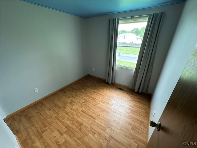8071 Evesborough Dr, Clay, NY 13041 - empty room featuring light wood-style floors and baseboards