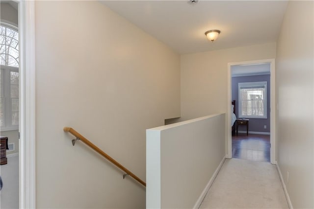 6270 Wolf Run Rd, Campbell, NY 14821 - hallway with an upstairs landing and light carpet
