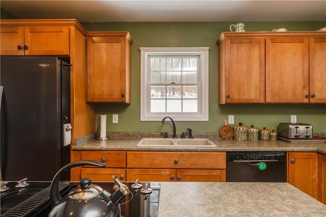 6270 Wolf Run Rd, Campbell, NY 14821 - kitchen with freestanding refrigerator, dishwasher, and brown cabinetry