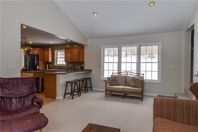 6270 Wolf Run Rd, Campbell, NY 14821 - living area featuring light carpet, recessed lighting, lofted ceiling, and a chandelier