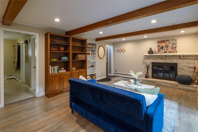 151 Chapel Hill Dr, Irondequoit, NY 14617 - living area featuring a baseboard heating unit, beam ceiling, a fireplace, wood finished floors, and recessed lighting