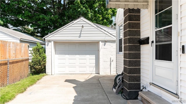610 Huth Rd, Cheektowaga, NY 14225 - detached garage featuring concrete driveway