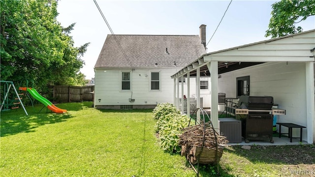 610 Huth Rd, Cheektowaga, NY 14225 - back of property featuring a playground and roof with shingles
