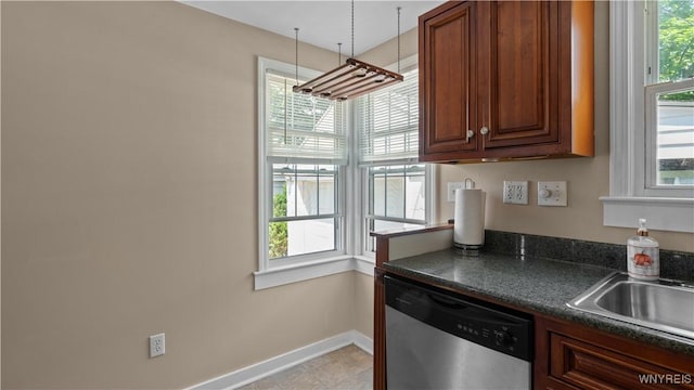 610 Huth Rd, Cheektowaga, NY 14225 - kitchen with stainless steel dishwasher and dark countertops