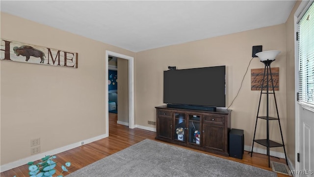 610 Huth Rd, Cheektowaga, NY 14225 - living area with wood finished floors and healthy amount of natural light