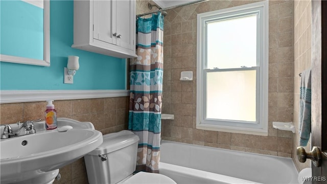 610 Huth Rd, Cheektowaga, NY 14225 - bathroom with shower / bath combo, healthy amount of natural light, and wainscoting