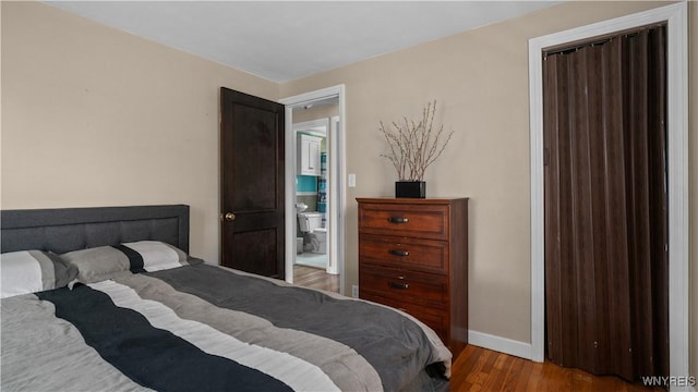 610 Huth Rd, Cheektowaga, NY 14225 - bedroom featuring wood finished floors and baseboards