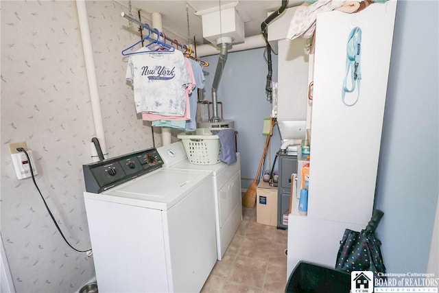 103 Springdale Ave, Jamestown, NY 14701 - washroom featuring washer and clothes dryer and light tile patterned flooring