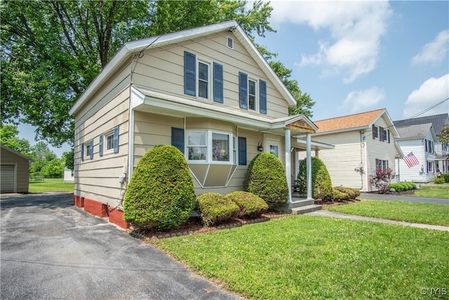225 Breen Ave, Watertown-City, NY 13601 - view of front of property featuring a front lawn and a garage