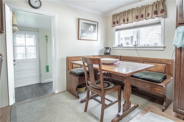 225 Breen Ave, Watertown-City, NY 13601 - dining space with ornamental molding, breakfast area, healthy amount of natural light, and light wood finished floors