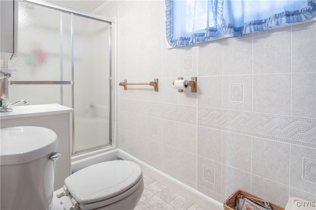225 Breen Ave, Watertown-City, NY 13601 - bathroom featuring a shower with door and tile walls