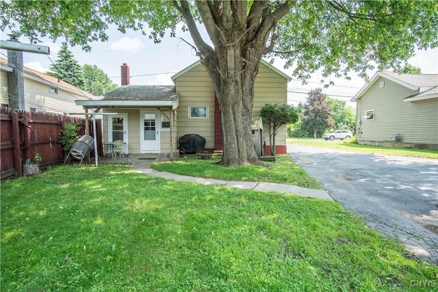 225 Breen Ave, Watertown-City, NY 13601 - view of front of property with driveway and a chimney