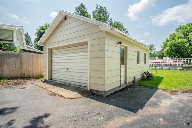 225 Breen Ave, Watertown-City, NY 13601 - detached garage featuring asphalt driveway