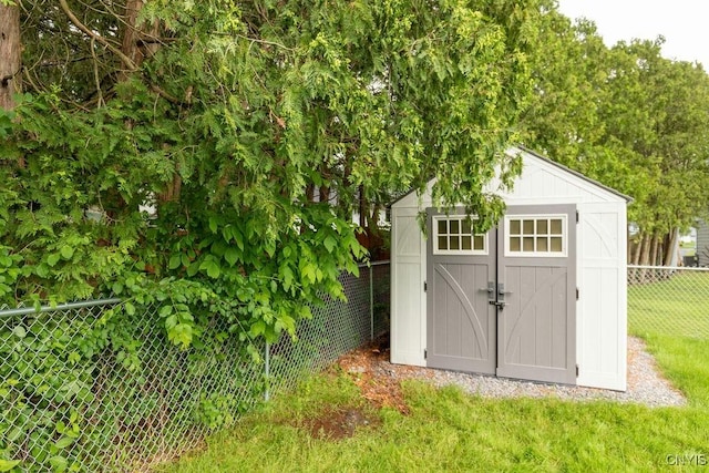 13 Berrywood Rd, Clay, NY 13090 - view of shed with a fenced backyard