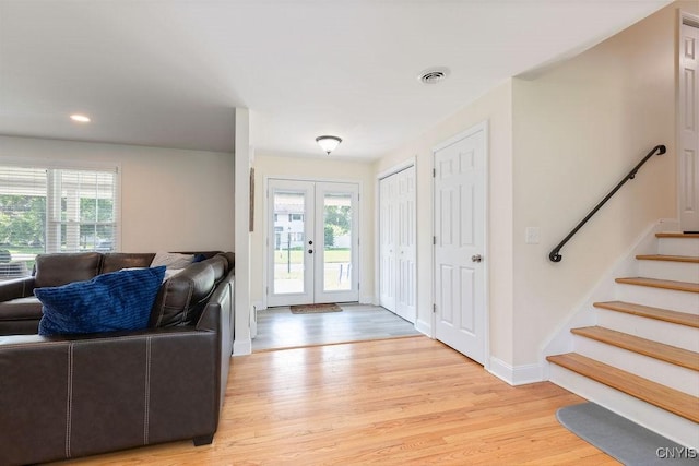 13 Berrywood Rd, Clay, NY 13090 - foyer featuring french doors, light wood-style floors, plenty of natural light, and recessed lighting
