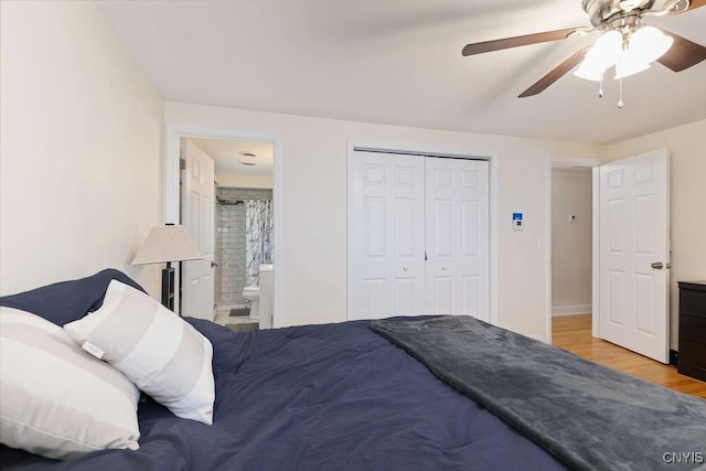 13 Berrywood Rd, Clay, NY 13090 - bedroom with light wood-style floors, ceiling fan, a closet, and ensuite bath