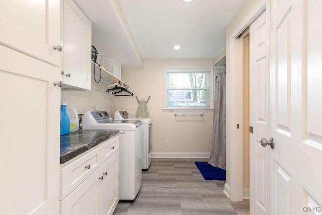 13 Berrywood Rd, Clay, NY 13090 - washroom featuring cabinet space, separate washer and dryer, recessed lighting, and light wood-type flooring
