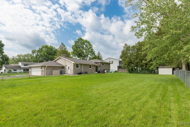 13 Berrywood Rd, Clay, NY 13090 - fenced backyard featuring a garage and a storage shed