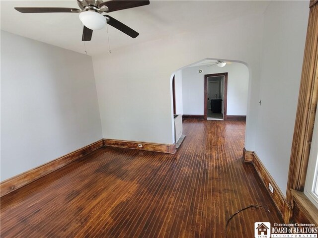 116 Park St, Jamestown, NY 14701 - spare room with arched walkways, a ceiling fan, and hardwood / wood-style floors