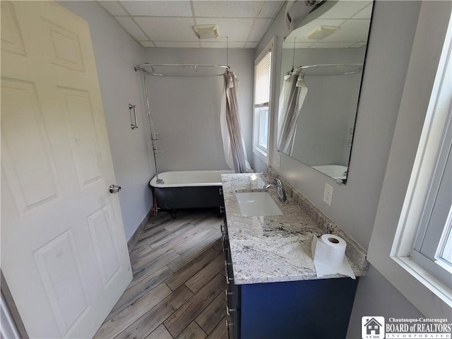 116 Park St, Jamestown, NY 14701 - full bath featuring wood finished floors, vanity, and a paneled ceiling